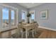 Charming ocean view dining area with yellow tablecloth and white chairs at 1681 E Ashley Ave # A & B, Folly Beach, SC 29439