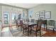 Elegant dining room with hardwood floors and ocean views at 1681 E Ashley Ave # A & B, Folly Beach, SC 29439