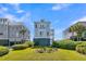 Charming beachfront home with a landscaped front yard at 1681 E Ashley Ave # A & B, Folly Beach, SC 29439