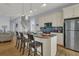 Modern kitchen with white cabinets, granite countertops and breakfast bar at 1681 E Ashley Ave # A & B, Folly Beach, SC 29439