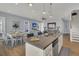 Modern kitchen with island, stainless steel appliances, and ocean views at 1681 E Ashley Ave # A & B, Folly Beach, SC 29439