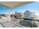 Balcony overlooks ocean and neighboring homes at 1681 E Ashley Ave # A & B, Folly Beach, SC 29439