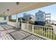 Porch with ocean views and white railings at 1681 E Ashley Ave # A & B, Folly Beach, SC 29439