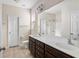 Main bathroom with double vanity and a large mirror at 1762 Bee Balm Rd, Johns Island, SC 29455