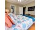 Main bedroom with TV and en-suite bathroom at 209 Palmetto Blvd, Edisto Beach, SC 29438