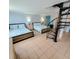 Two bedrooms with tiled floors, full beds, and coastal decor at 209 Palmetto Blvd, Edisto Beach, SC 29438