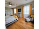 Bright bedroom with hardwood floors and plenty of storage at 209 Palmetto Blvd, Edisto Beach, SC 29438