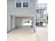 View under the house; driveway to garage at 209 Palmetto Blvd, Edisto Beach, SC 29438