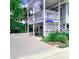 Elevated beach house with white lattice and stairs at 209 Palmetto Blvd, Edisto Beach, SC 29438