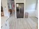 Modern kitchen with stainless steel appliances and white cabinets at 209 Palmetto Blvd, Edisto Beach, SC 29438