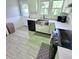 Modern kitchen with stainless steel appliances and white cabinets at 209 Palmetto Blvd, Edisto Beach, SC 29438