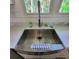 Farmhouse sink with a modern faucet and marble countertop at 209 Palmetto Blvd, Edisto Beach, SC 29438