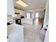 Open concept kitchen with breakfast bar and stainless steel appliances at 209 Palmetto Blvd, Edisto Beach, SC 29438