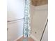 Simple shower stall with seashell-themed curtain at 209 Palmetto Blvd, Edisto Beach, SC 29438