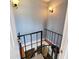 Spiral staircase leading to upper or lower level with light blue walls at 209 Palmetto Blvd, Edisto Beach, SC 29438
