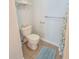 Clean and well-maintained toilet and tiled floor at 209 Palmetto Blvd, Edisto Beach, SC 29438