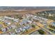 Aerial view of a luxury community with waterfront homes and landscaped grounds at 2186 Midden Dr, Mount Pleasant, SC 29466