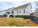 House back exterior, showing a deck and fenced yard at 2186 Midden Dr, Mount Pleasant, SC 29466