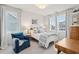 Bedroom with two windows, a cozy armchair and a desk at 2186 Midden Dr, Mount Pleasant, SC 29466