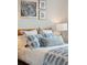 Serene bedroom featuring a bed with blue and white bedding at 2186 Midden Dr, Mount Pleasant, SC 29466