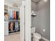 Walk in closet with toilet and shelving at 2186 Midden Dr, Mount Pleasant, SC 29466