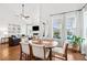 Bright dining area with wood table and view to backyard at 2186 Midden Dr, Mount Pleasant, SC 29466