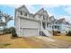 Two-story house with gray siding, white trim, and a front porch at 2186 Midden Dr, Mount Pleasant, SC 29466