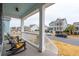 Front porch view of a quiet suburban street at 2186 Midden Dr, Mount Pleasant, SC 29466