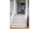 White front steps leading to a dark gray front door at 2186 Midden Dr, Mount Pleasant, SC 29466