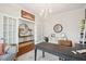 Spacious home office with hardwood floors and built-in shelving at 2186 Midden Dr, Mount Pleasant, SC 29466