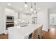 Modern kitchen with white cabinets, quartz countertops and island at 2186 Midden Dr, Mount Pleasant, SC 29466