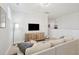 Comfortable loft sitting area with sectional sofa and media console at 2186 Midden Dr, Mount Pleasant, SC 29466