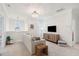 Bright loft sitting area with sectional sofa and media console at 2186 Midden Dr, Mount Pleasant, SC 29466