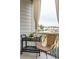 Relaxing screened porch with wicker furniture and view at 2186 Midden Dr, Mount Pleasant, SC 29466