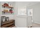 Upstairs hallway with built-in shelves and decorative accents at 2186 Midden Dr, Mount Pleasant, SC 29466