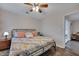 King bedroom with coastal decor and access to another room at 2345 Tall Sail Dr # C, Charleston, SC 29414