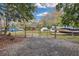Gated boat storage area with various boats and trailers at 2345 Tall Sail Dr # C, Charleston, SC 29414
