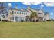 Two-story yellow home with large backyard and patio at 2345 Tall Sail Dr # C, Charleston, SC 29414