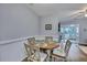 Dining area with round table and four chairs, near sunroom at 2345 Tall Sail Dr # C, Charleston, SC 29414