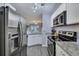 Modern kitchen with stainless steel appliances and granite countertops at 2345 Tall Sail Dr # C, Charleston, SC 29414
