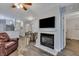 Living room with fireplace and view into kitchen and bedroom at 2345 Tall Sail Dr # C, Charleston, SC 29414