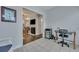 Home office with a desk and view into living area at 2345 Tall Sail Dr # C, Charleston, SC 29414