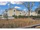 Building exterior with marsh grass in the foreground at 2345 Tall Sail Dr # C, Charleston, SC 29414
