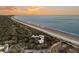 Aerial view of beachfront property with ocean and coastal landscape at 2371 Shipwatch Rd, Kiawah Island, SC 29455