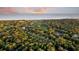Aerial view of upscale homes, golf course, and ocean at 2371 Shipwatch Rd, Kiawah Island, SC 29455