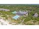 Aerial view showing community pool, clubhouse, and beach access at 2371 Shipwatch Rd, Kiawah Island, SC 29455