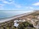 Aerial view of beachfront property, showcasing ocean and beach at 2371 Shipwatch Rd, Kiawah Island, SC 29455
