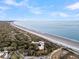 Aerial view of beachfront community near ocean and shoreline at 2371 Shipwatch Rd, Kiawah Island, SC 29455