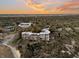 Aerial view of the community at sunset at 2371 Shipwatch Rd, Kiawah Island, SC 29455