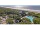 Aerial view of community pool, clubhouse, and beach access at 2371 Shipwatch Rd, Kiawah Island, SC 29455